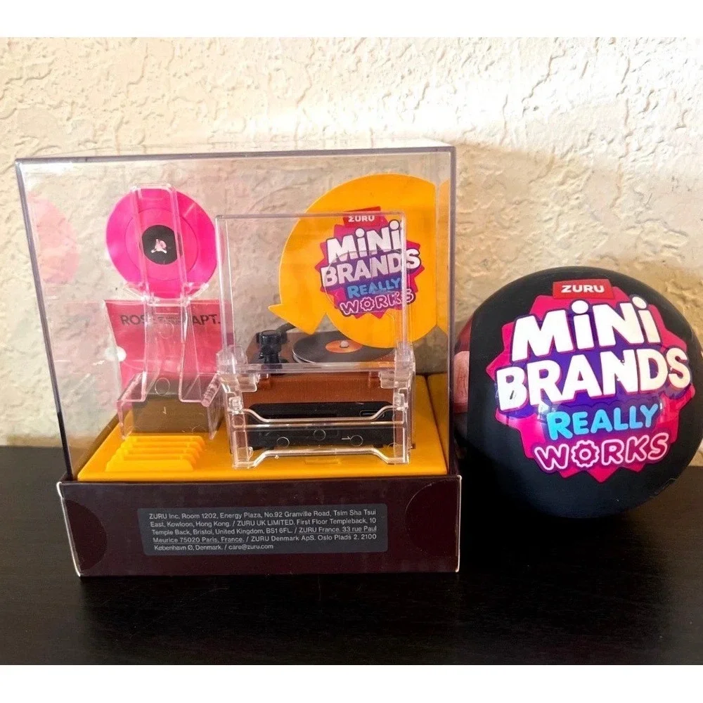 1 Zuru Mini Brands Really Works Vinyl Capsules + Music Player